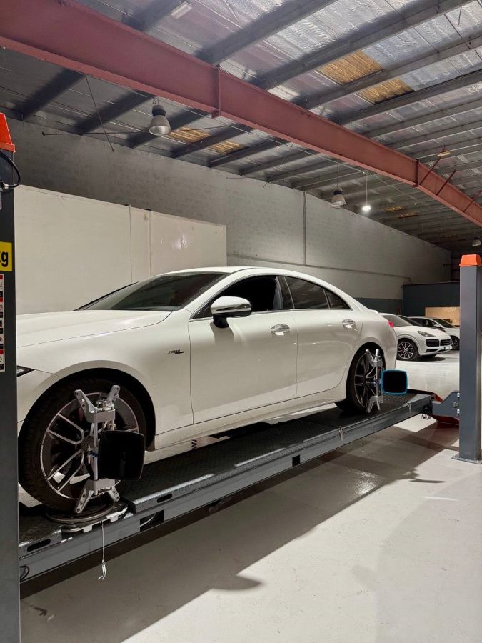 Wheel alignment in progress on a Mercedes-Benz at BavarLand